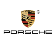 Porsche crest logo: black prancing horse on a yellow shield with red and black stripes and “Stuttgart” wordmark, symbolizing racing pedigree and engineering excellence